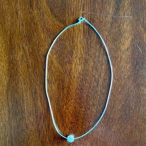 Silver necklace with ball charm